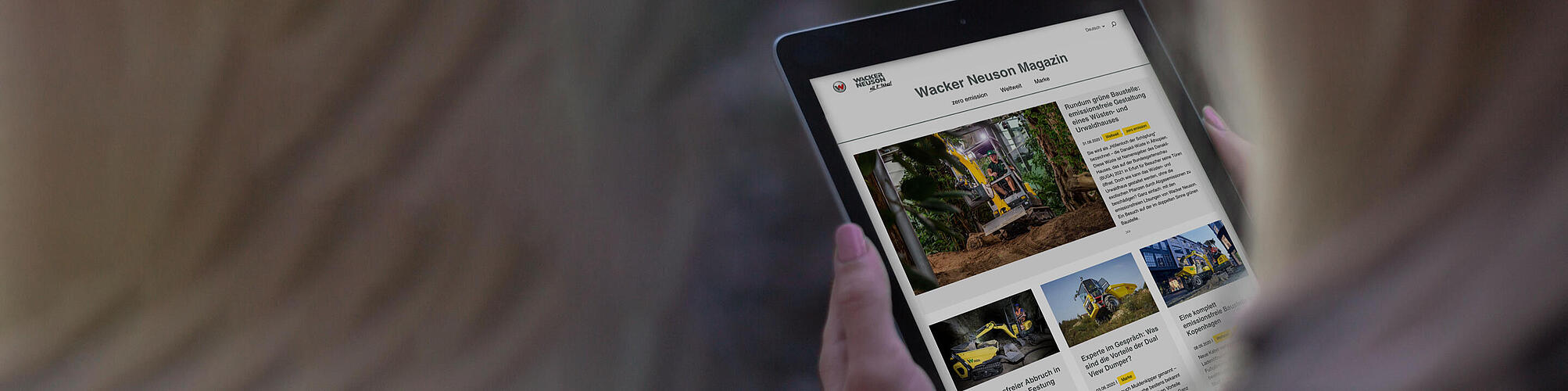 Wacker Neuson Online Magazine on a tablet.
