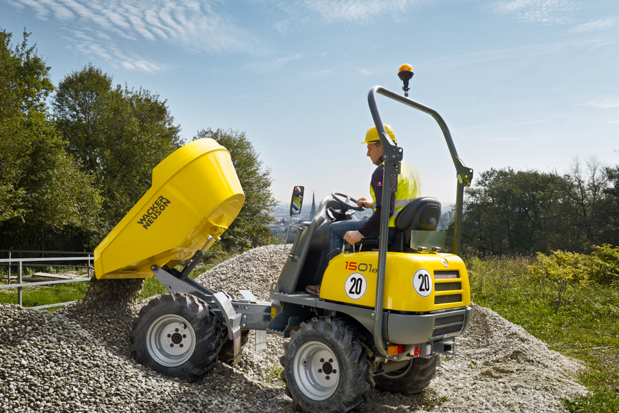 Wheel dumper 1501s unloading ballast on a construction site in the area