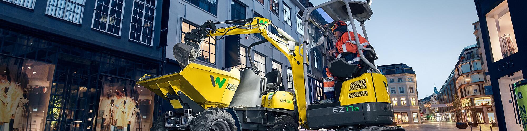 Wacker Neuson zero tail excavator EZ17e in application on a construction site in the city.