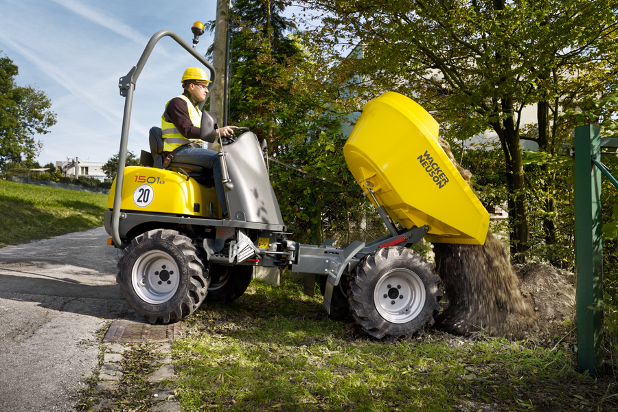 1501s wheel dumper unloading earth in the field