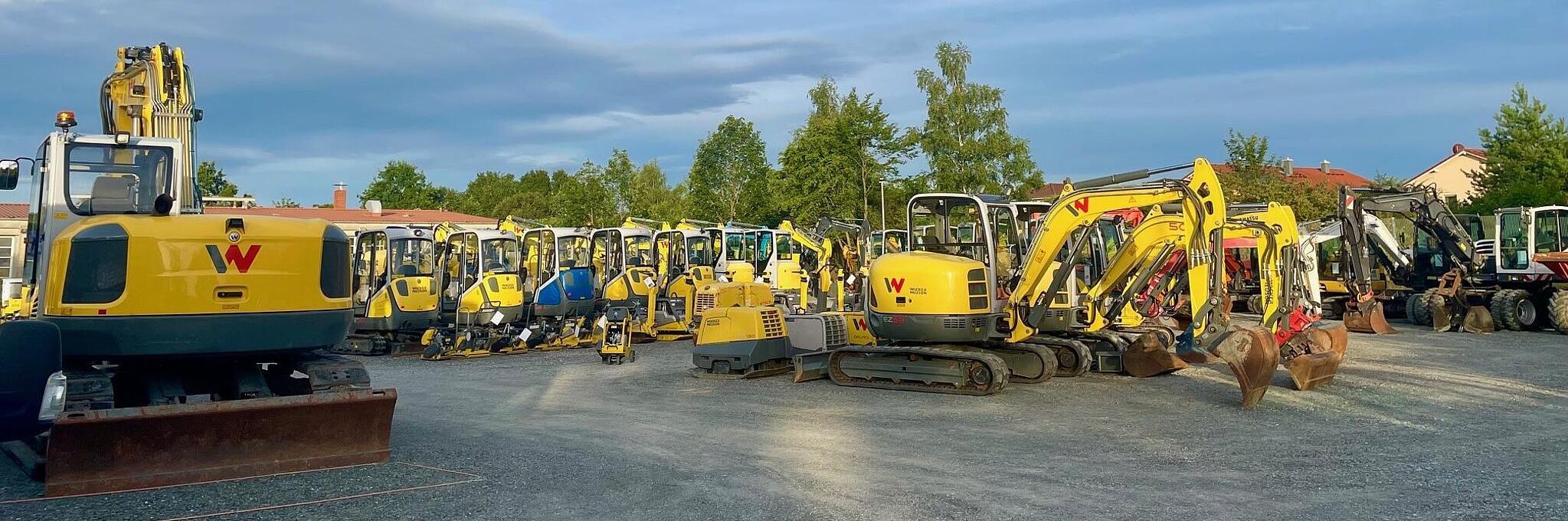 Used machines and excavators in one yard