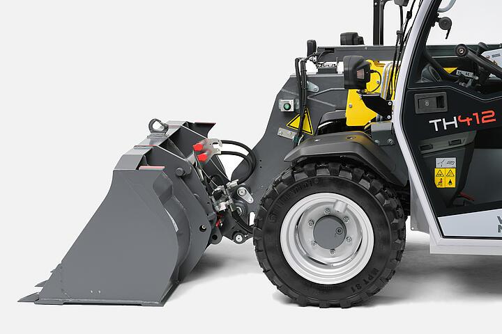 Телескопический погрузчик Wacker Neuson TH412, гидравлическая муфта с плоской поверхностью