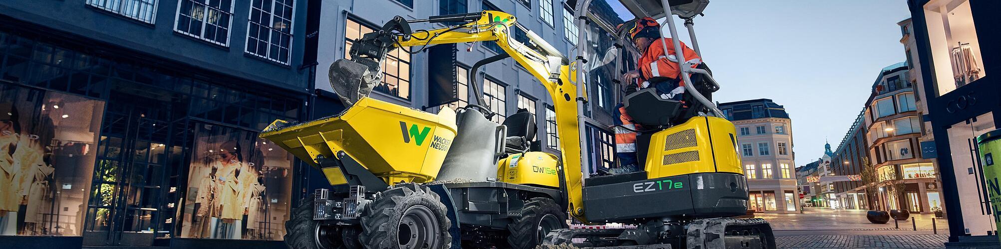 Wacker Neuson zero tail excavator EZ17e in application on a construction site in the city.