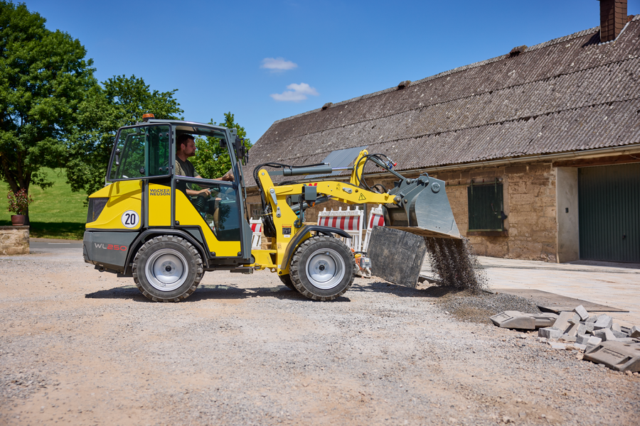 Wacker Neuson wheel loader WL250 in action with earth bucket