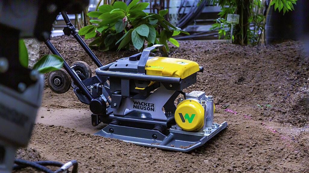 zero emission vibratory plate in action in landscaping.