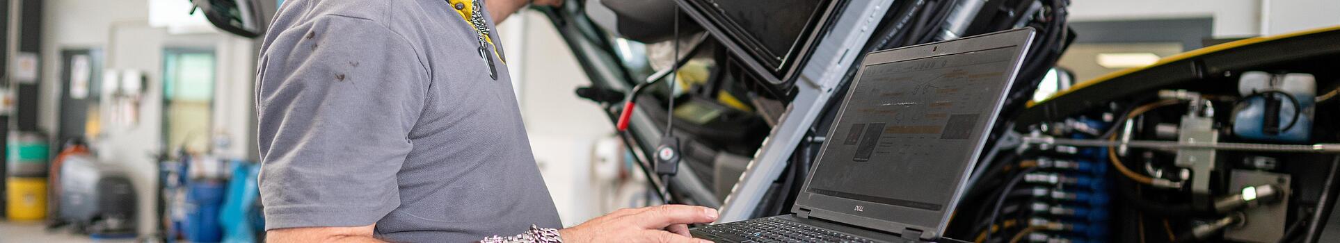 wacker neuson employee checks machine