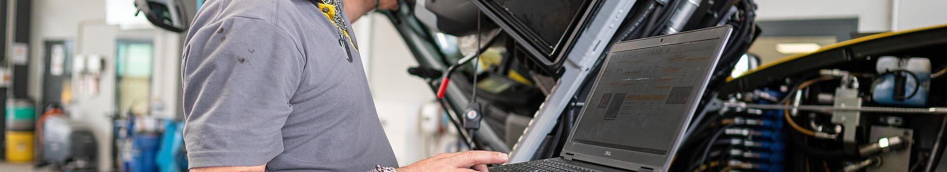 wacker neuson employee checks machine