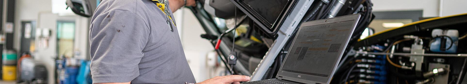 wacker neuson employee checks machine