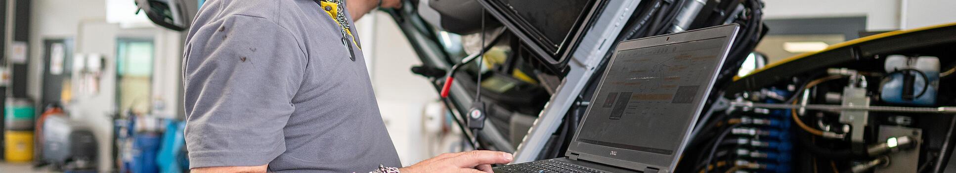 wacker neuson employee checks machine