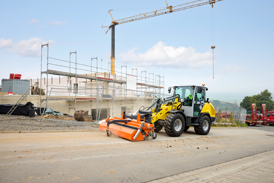 Wacker Neuson telehandler TH625 in application with sweeper