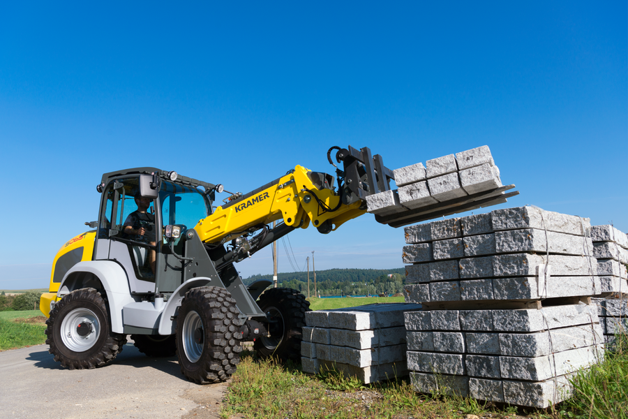 The Kramer telescopic wheel loader 5065T while loading stones.