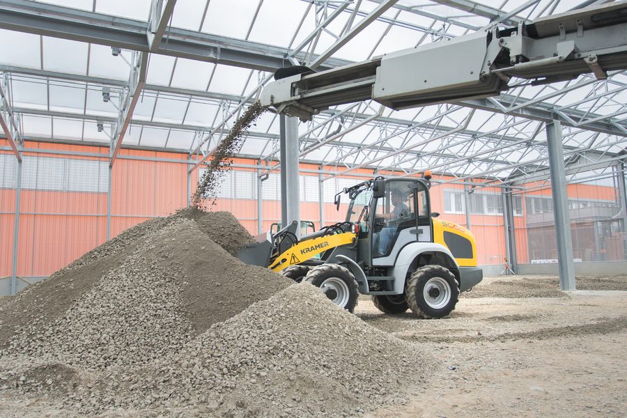 The Kramer wheel loader 5050 while loading bulk materials.