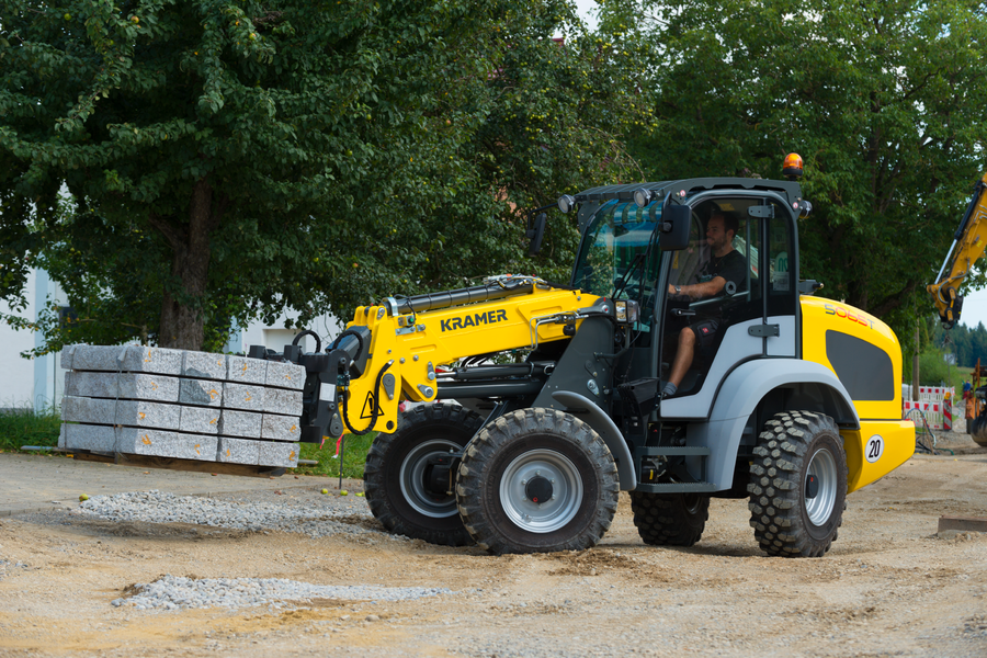 The Kramer telescopic wheel loader 5065T while loading stones.