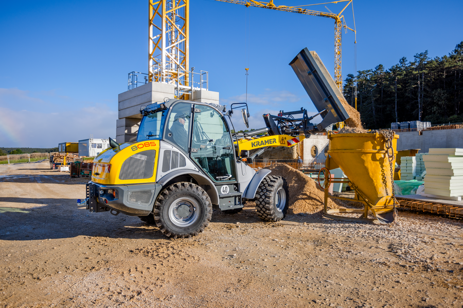 The Kramer wheel loader 8085 while dumping material.