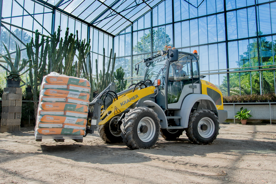 The Kramer wheel loader 5050 while loading material on a pallet.