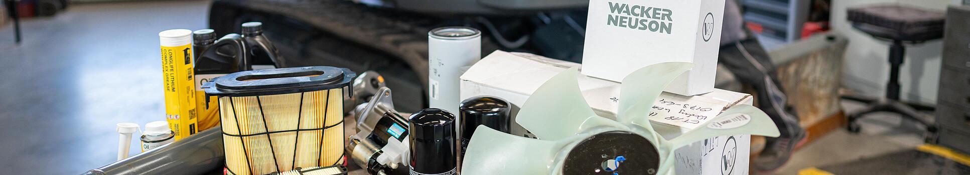 various wacker neuson spare parts in workshop