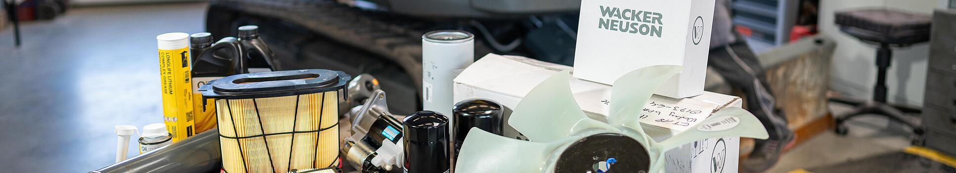 various wacker neuson spare parts in workshop