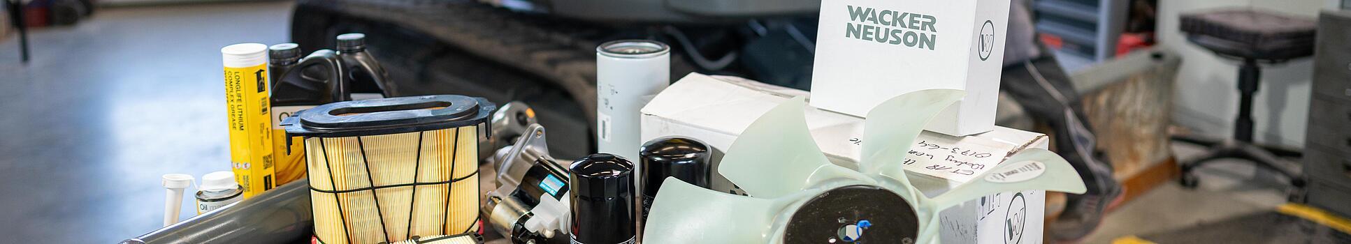 various wacker neuson spare parts in workshop