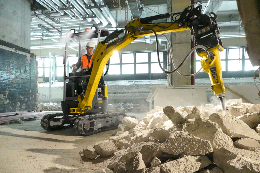 Demolition work with a hydraulic hammer on the EZ17e indoors