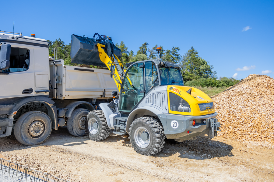 The Kramer wheel loader 8115 while loading stones.