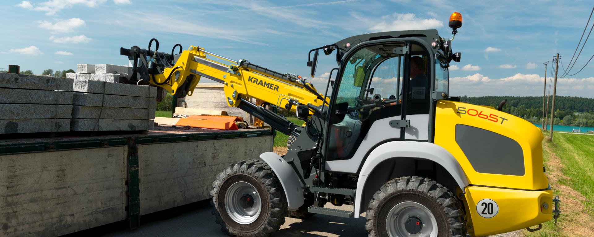 The Kramer telescopic wheel loader 5065T while loading stones.